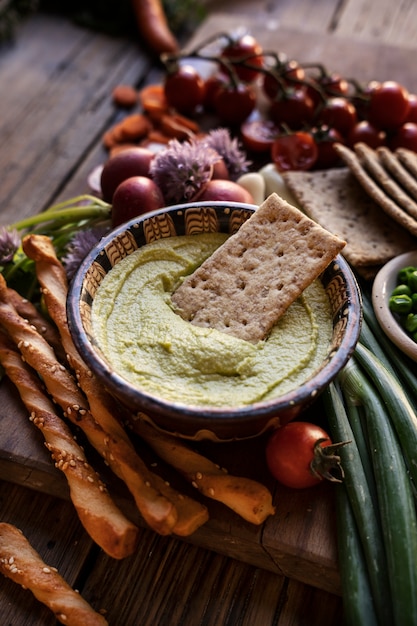 Free Photo top view over colorful hummus