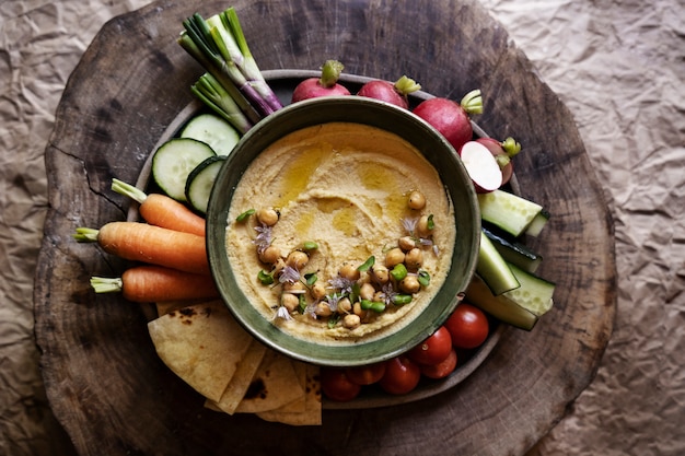 Top view over colorful hummus