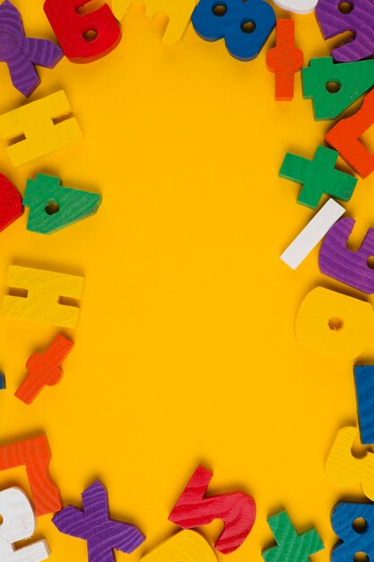 Top view of colorful letters and numbers frame for baby shower