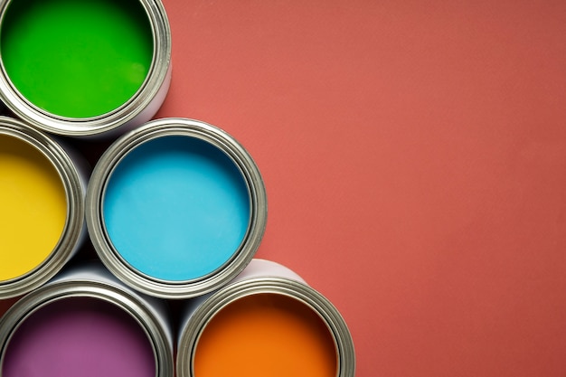 Free Photo top view colorful paint cans  arrangement