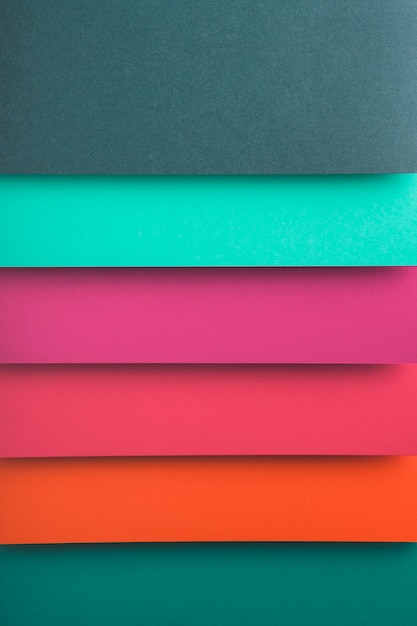 Free Photo top view of colorful paper sheets