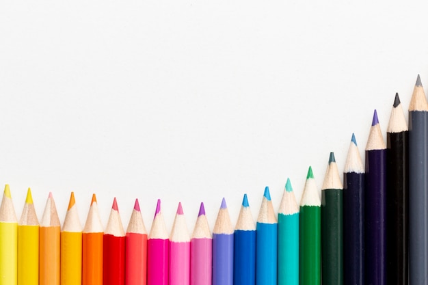 Top view of colorful pencils with copy space