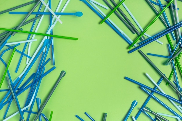 Free photo top view colorful plastic straw collection