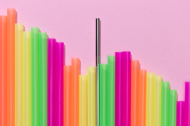 Free Photo top view of colorful plastic straws mixed with metal