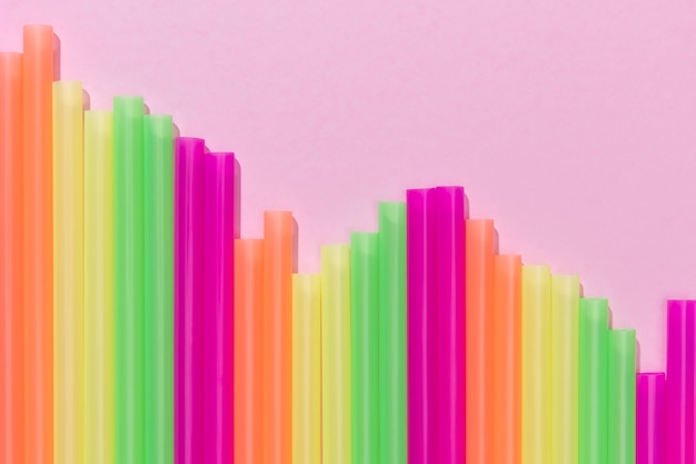 Free photo top view of colorful plastic straws