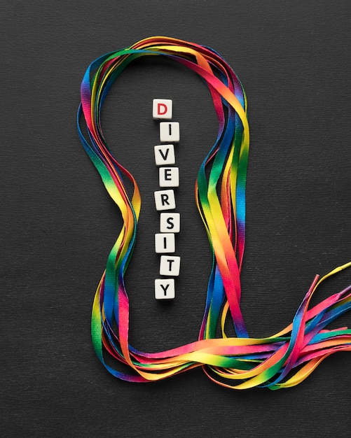 Free Photo top view colorful shoelaces arrangement on dark background