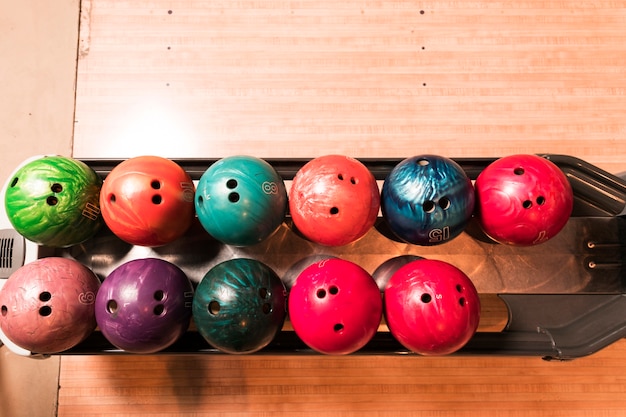 Free Photo top view colourful bowling balls