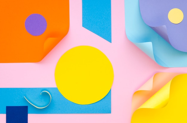 Free photo top view of colourful paper geometry and shapes