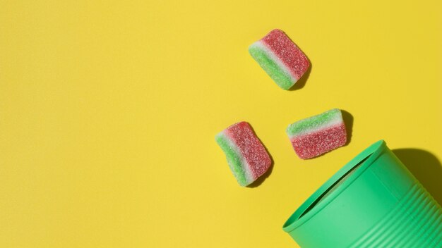 Top view composition of delicious candies