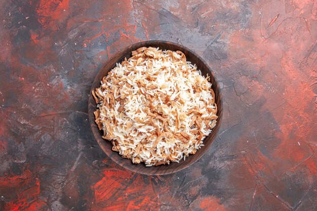 Free Photo top view cooked rice with dough slices on a dark surface dish meal dark food pasta