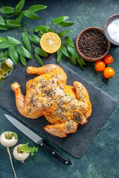 Top view cooked spiced chicken on dark-blue surface