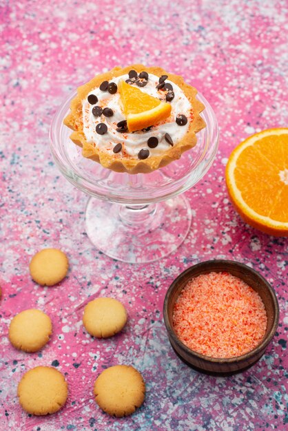 Top view cookies and cake with orange half on the bright desk cookie biscuit fruit cake sugar sweet