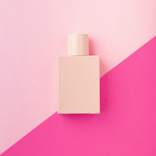 Top view of cosmetic bottle on plain background