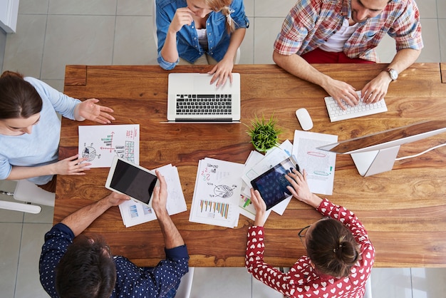 Top view coworkers team working at office