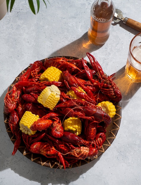 Free Photo top view crawfish and corn still life