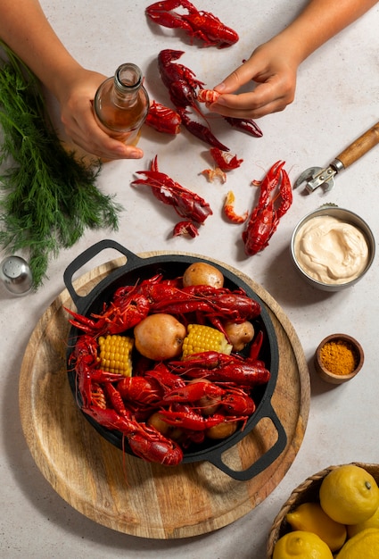 Top view crawfish and corn still life