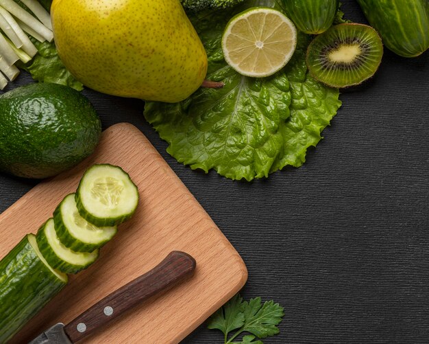 Top view of cucumber with pear and copy space