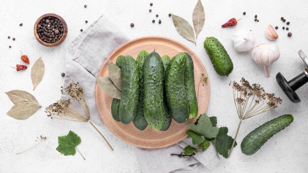 Top view cucumbers on wooden board