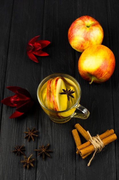 Top view cup of lemon tea with black background