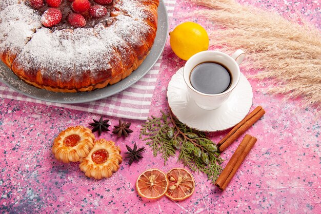 Top view cup of tea with cookies lemon cinnamon and cake on pink desk cookie biscuit sugar sweet cake