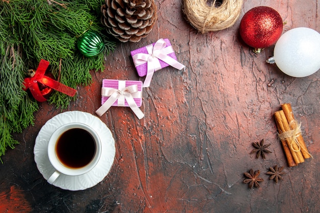 Free photo top view cup of tea with toys