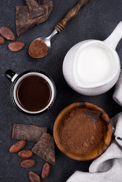 Top view cup with hot chocolate with milk