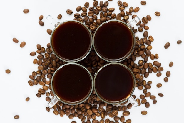 Top view cups and grains  of coffee