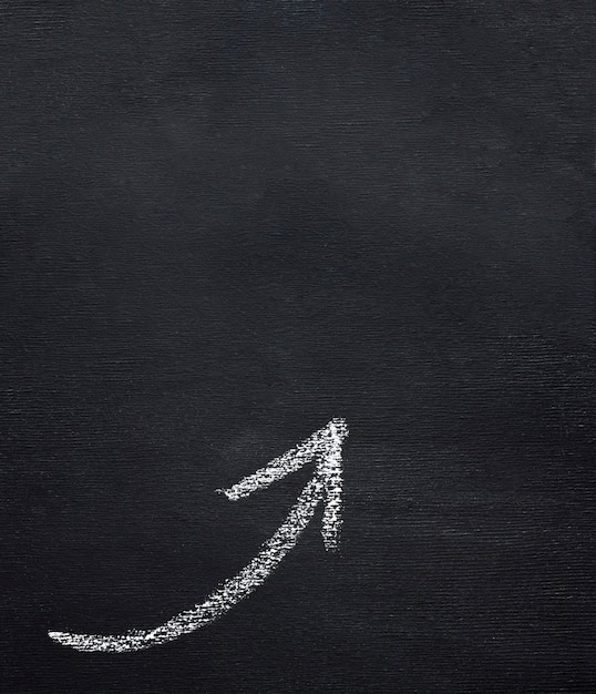 Free photo top view of curved chalk arrow with copy space