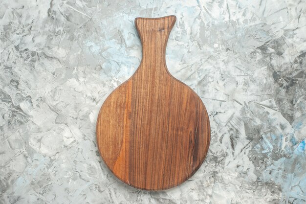 Top view cutting board on grey background