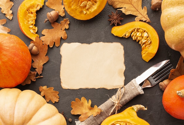 Free photo top view decoration with pumpkins and pie