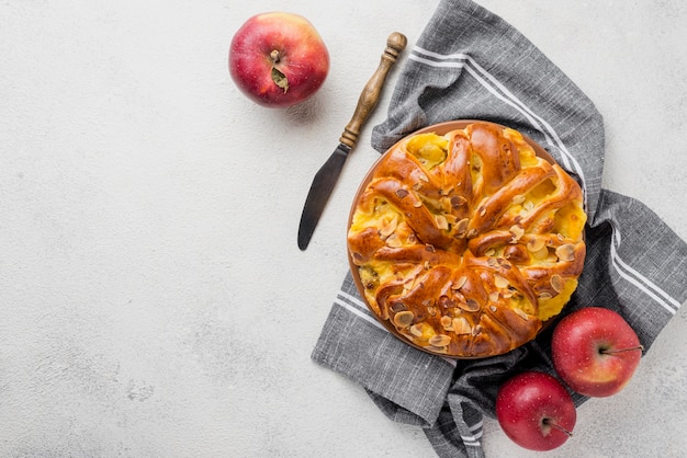 Top view delicious baked pie with apples