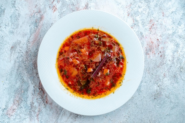 Free photo top view delicious borsch famous ukranian beet soup with meat inside plate on a light white space