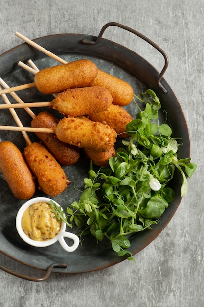 Free photo top view on delicious corn dog