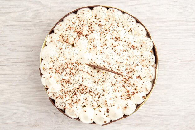 Top view delicious cream cake on white background pie color sweet honey sugar photo dessert birthday