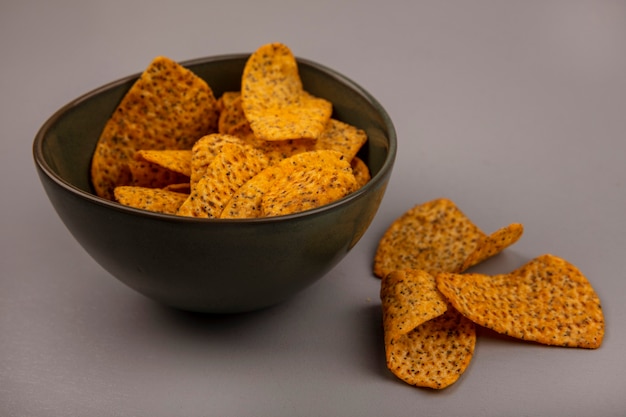 Free Photo top view of delicious crispy potato chips on a bowl with chips isolated