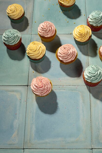 Top view delicious cupcakes arrangement