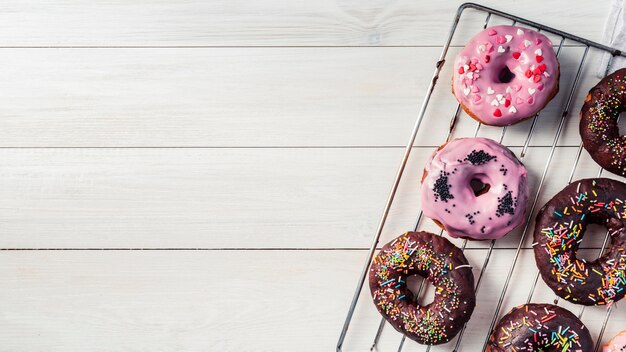 Free photo top view of delicious donuts concept