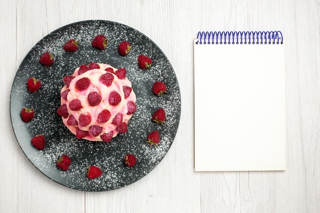 Top view delicious fruit cake cream dessert with raspberries on white background cream dessert biscuit sweet cake pie tea