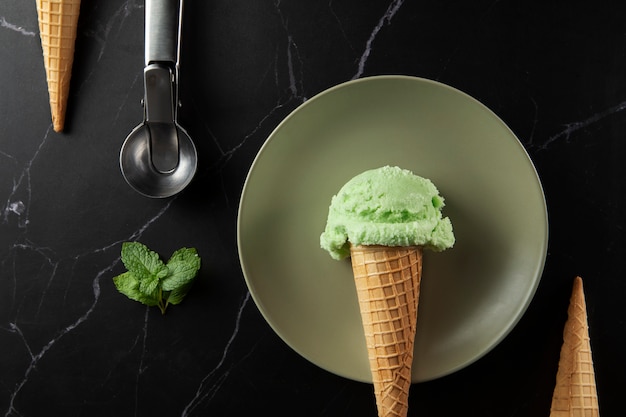 Free photo top view delicious green ice cream still life