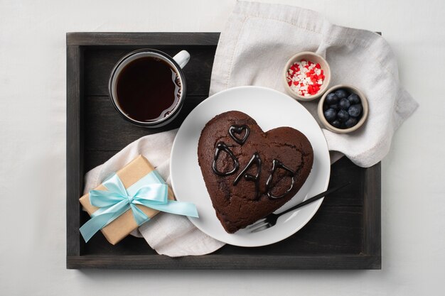 Free photo top view delicious heart shape cake