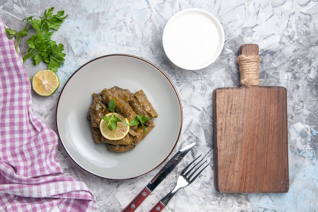 Free Photo top view of delicious leaf dolma inside plate on white surface