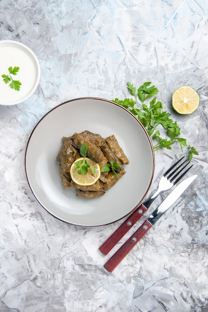 Free Photo top view of delicious leaf dolma with greens on white surface