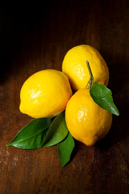 Top view delicious lemons on table