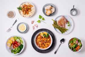 Free photo top view delicious meals arrangement