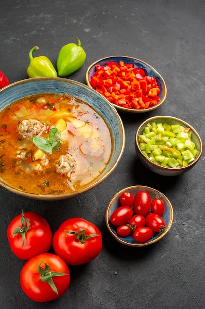 Free Photo top view delicious meat soup with fresh vegetables on dark table dish photo meal