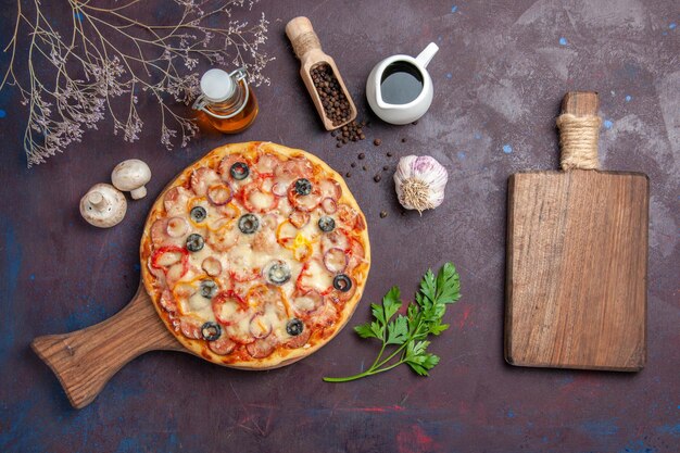 Top view delicious mushroom pizza with cheese and olives on a dark surface meal food dough snack pizza italian