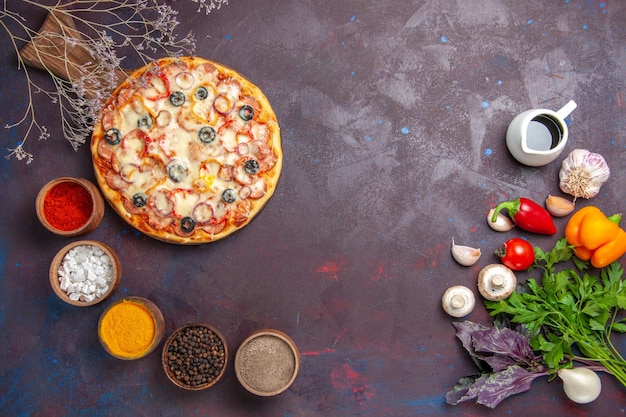 Top view delicious mushroom pizza with cheese olives and seasonings on the dark surface dough food pizza meal italian