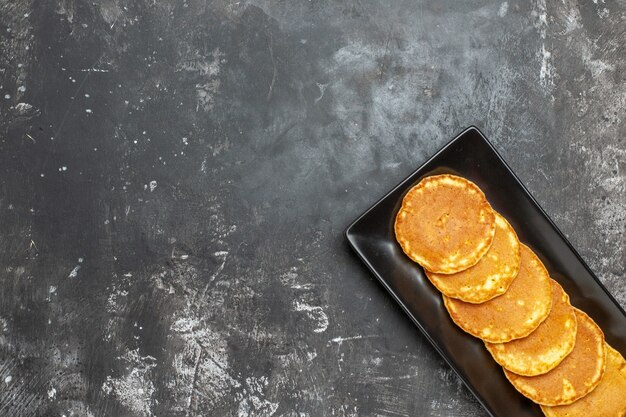 Top view on delicious pancakes on plate