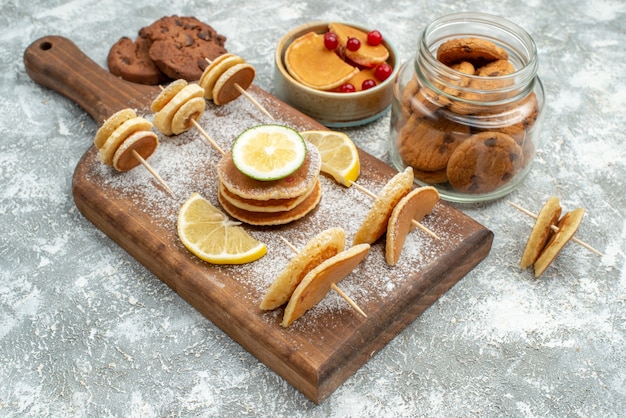 Top view on delicious pancakes with various ingredients