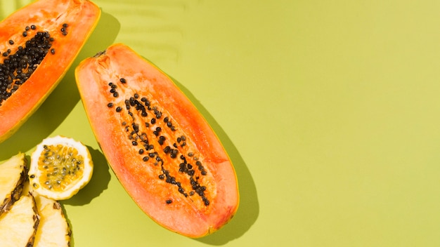 Free Photo top view delicious papaya fruit with copy space